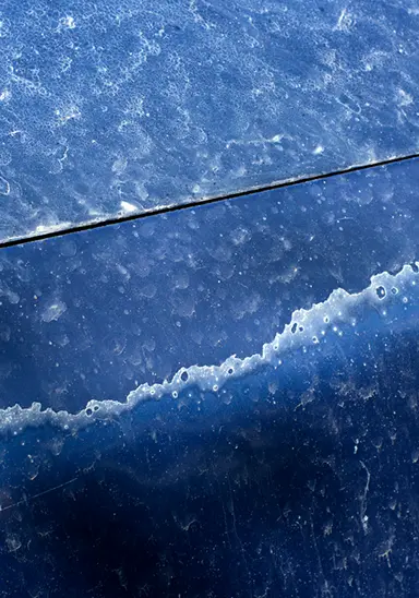 Water spots and mineral deposits on car paint after washing